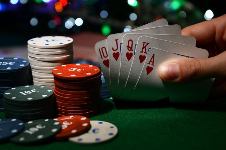 wikatogel Three Card Poker live dealer table with hand rankings display